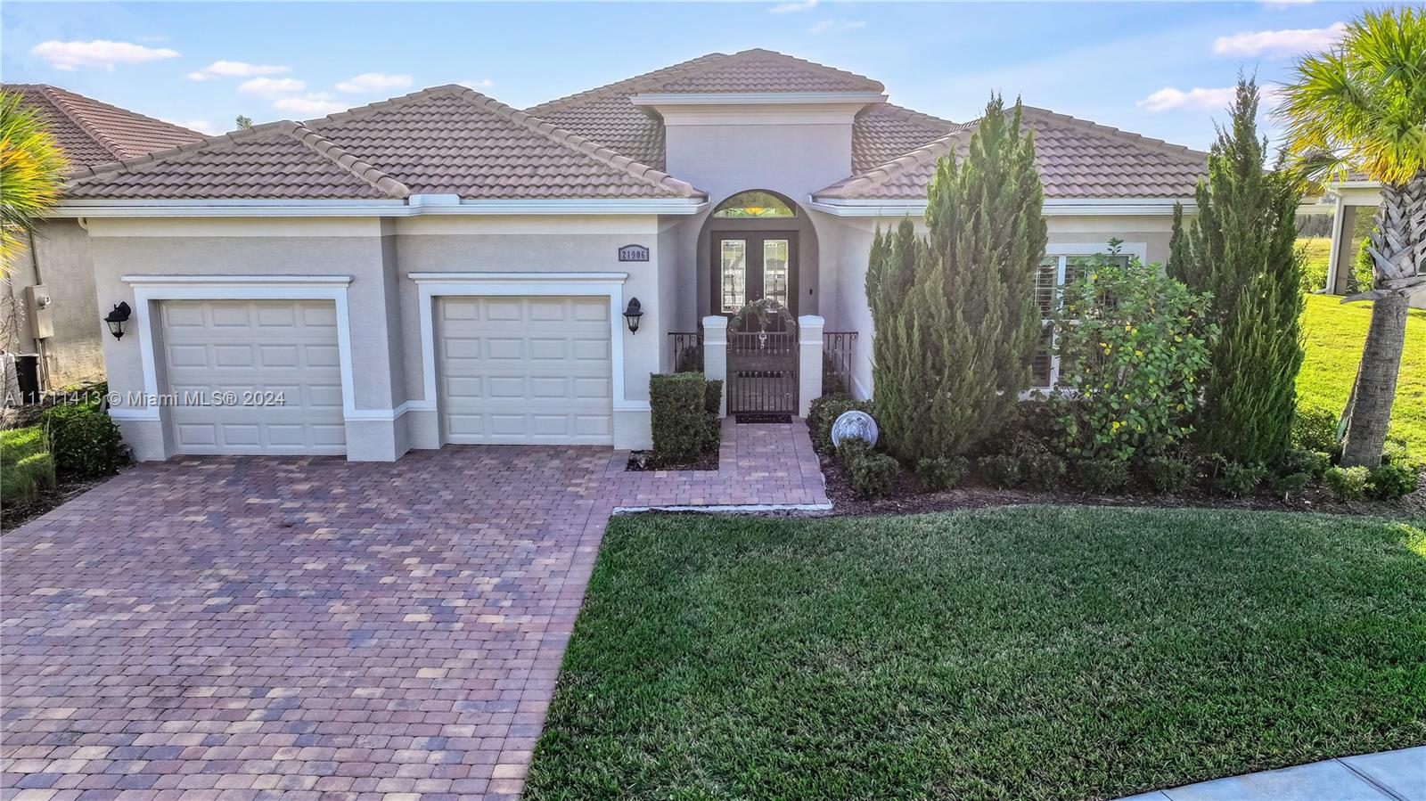 front view of a house with a yard