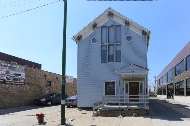 a front view of a building with street