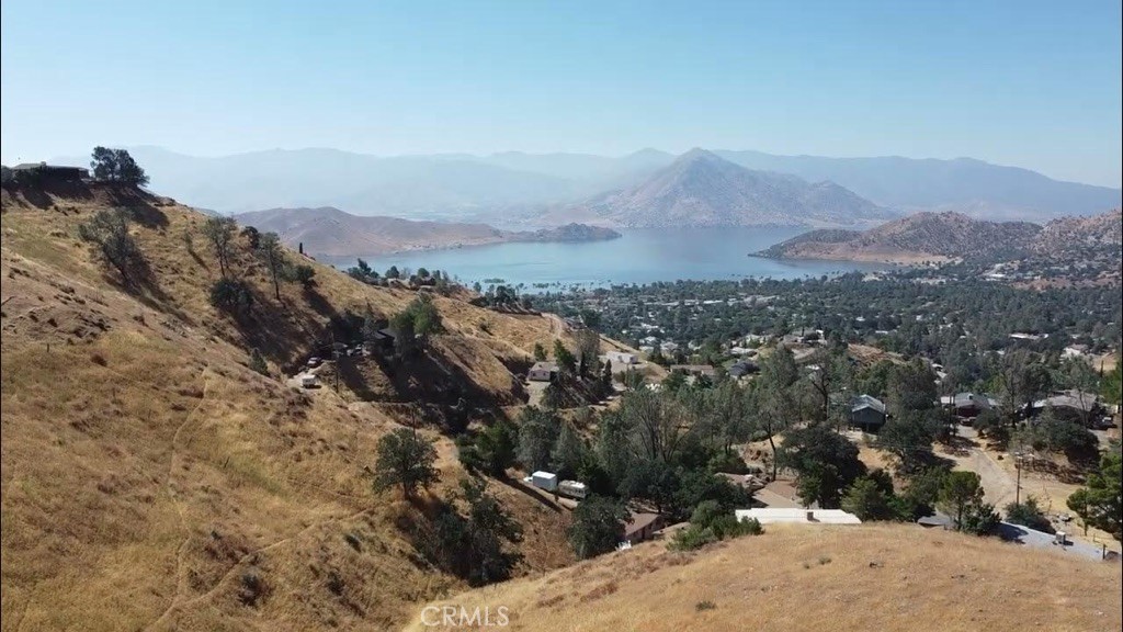 a view of a city with mountains in the background