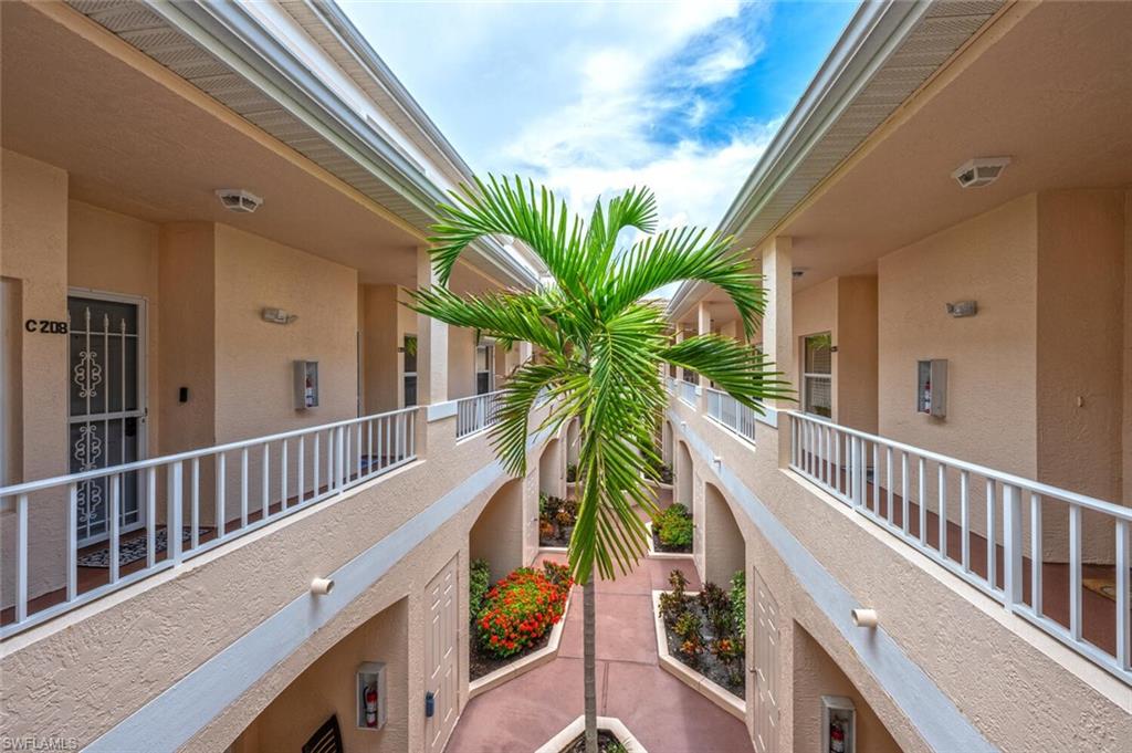 a view of balcony and wooden floor