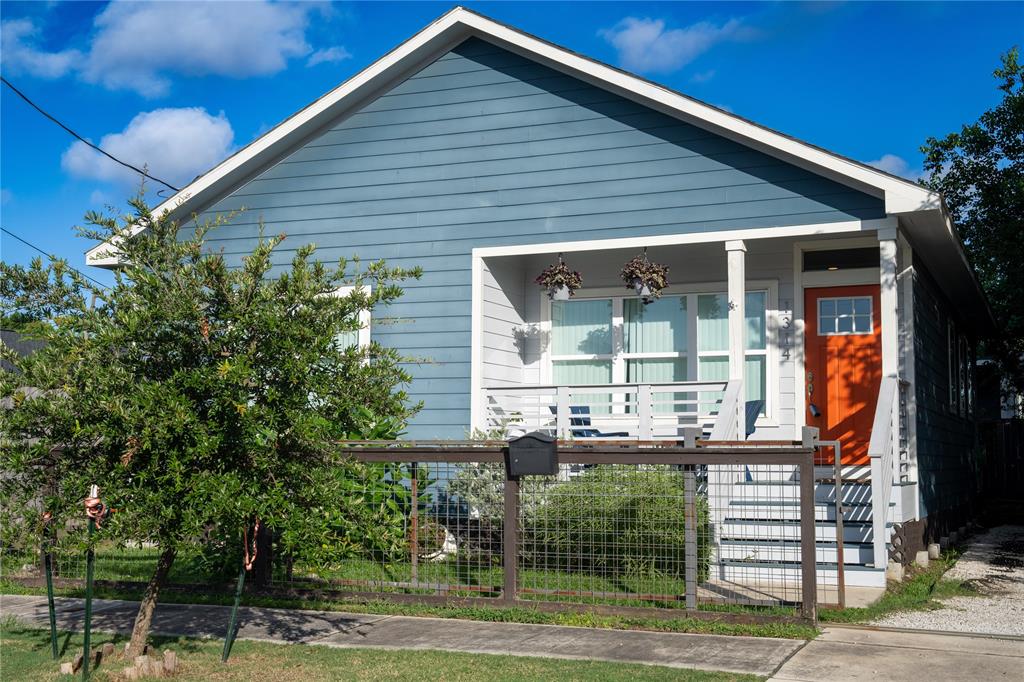 a front view of a house with a porch