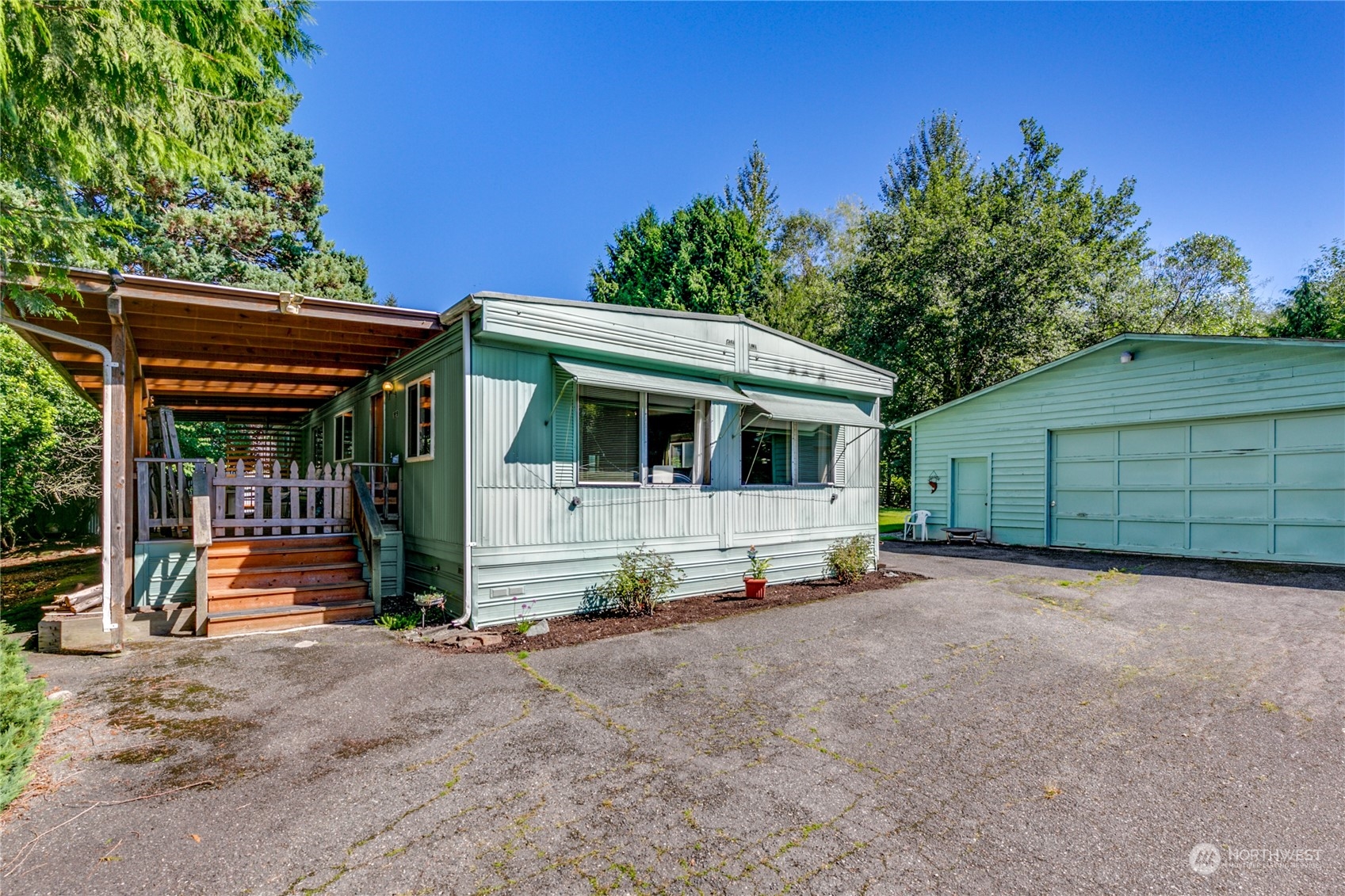 a view of house with outdoor space and porch