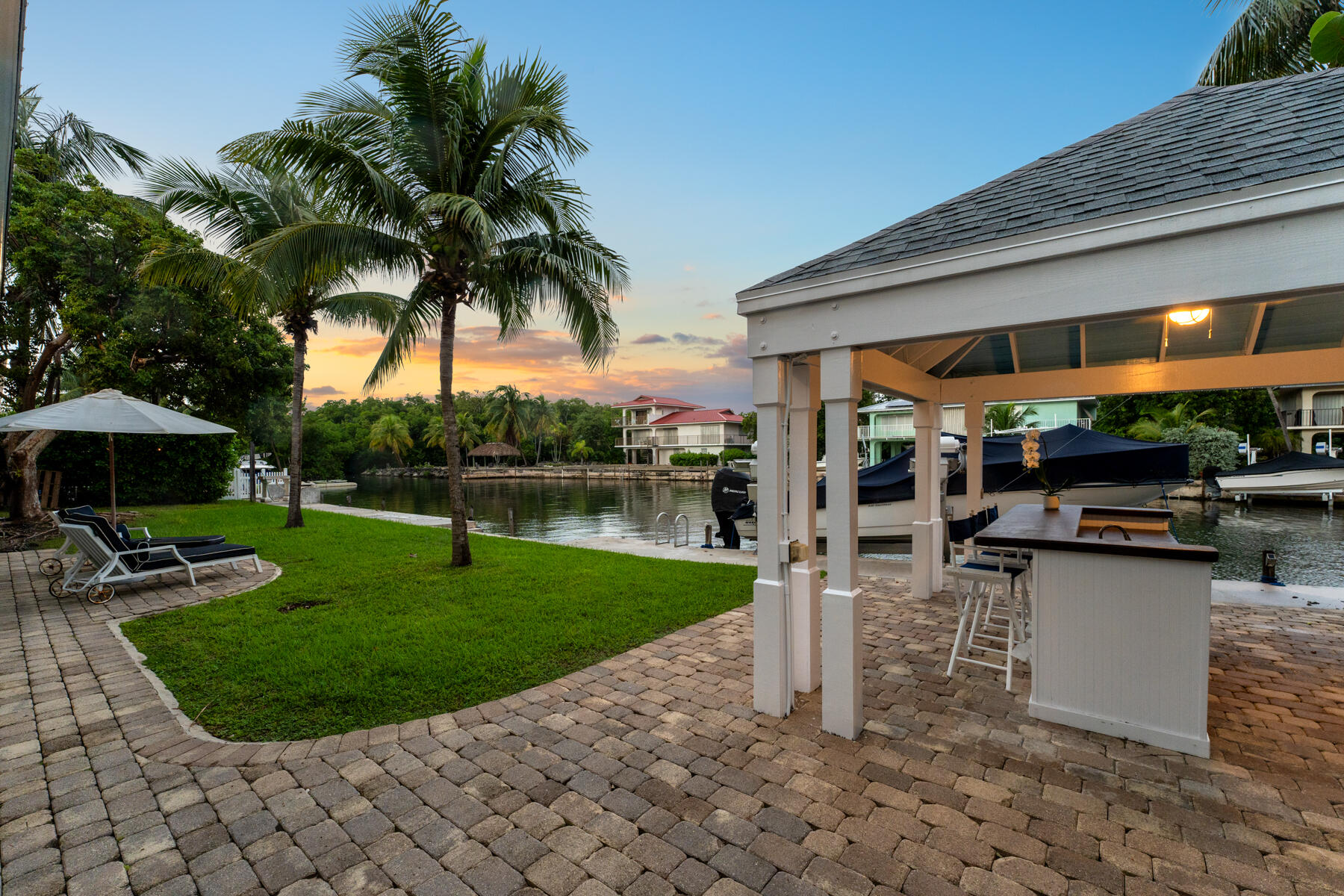 a view of a backyard with patio