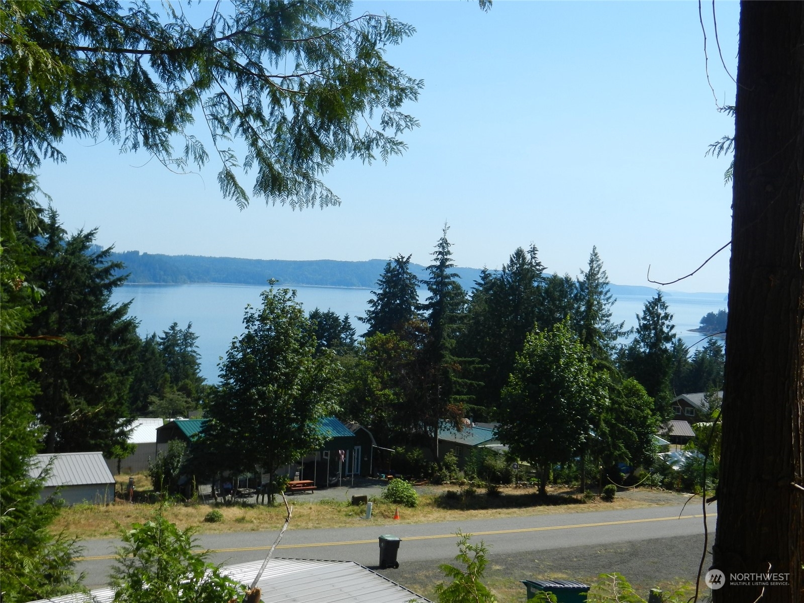 a view of swimming pool from a lake view