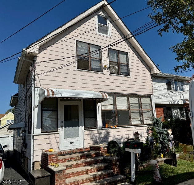 a view of house with street