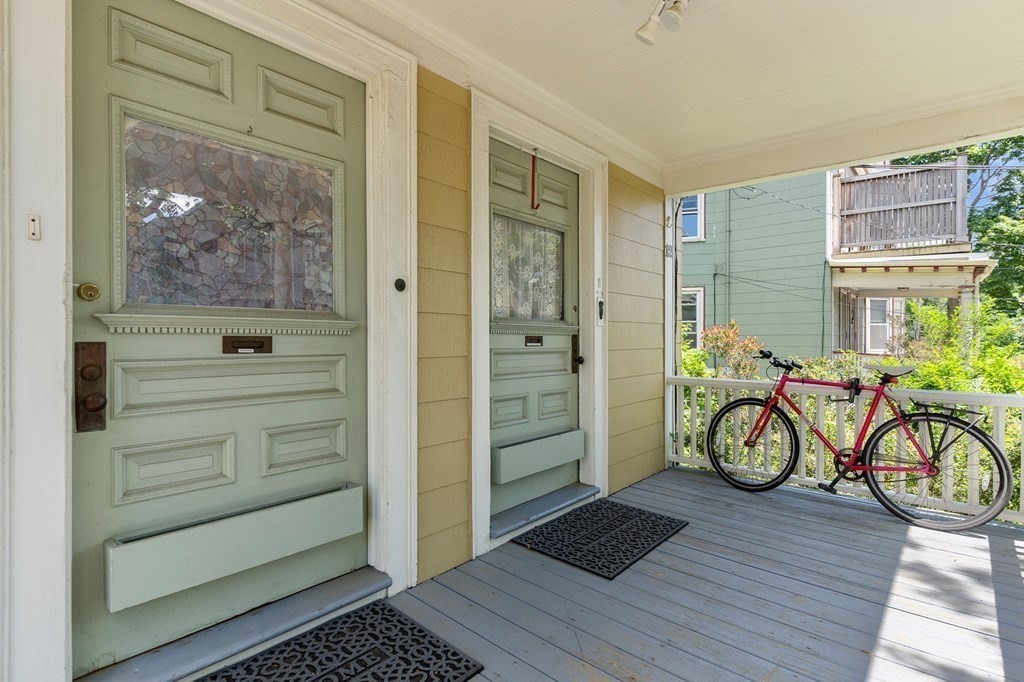 a view of entryway with wooden floor