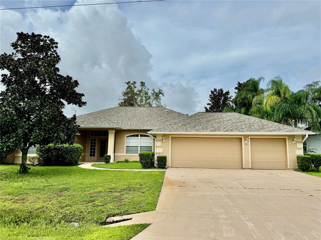 front view of a house with a yard