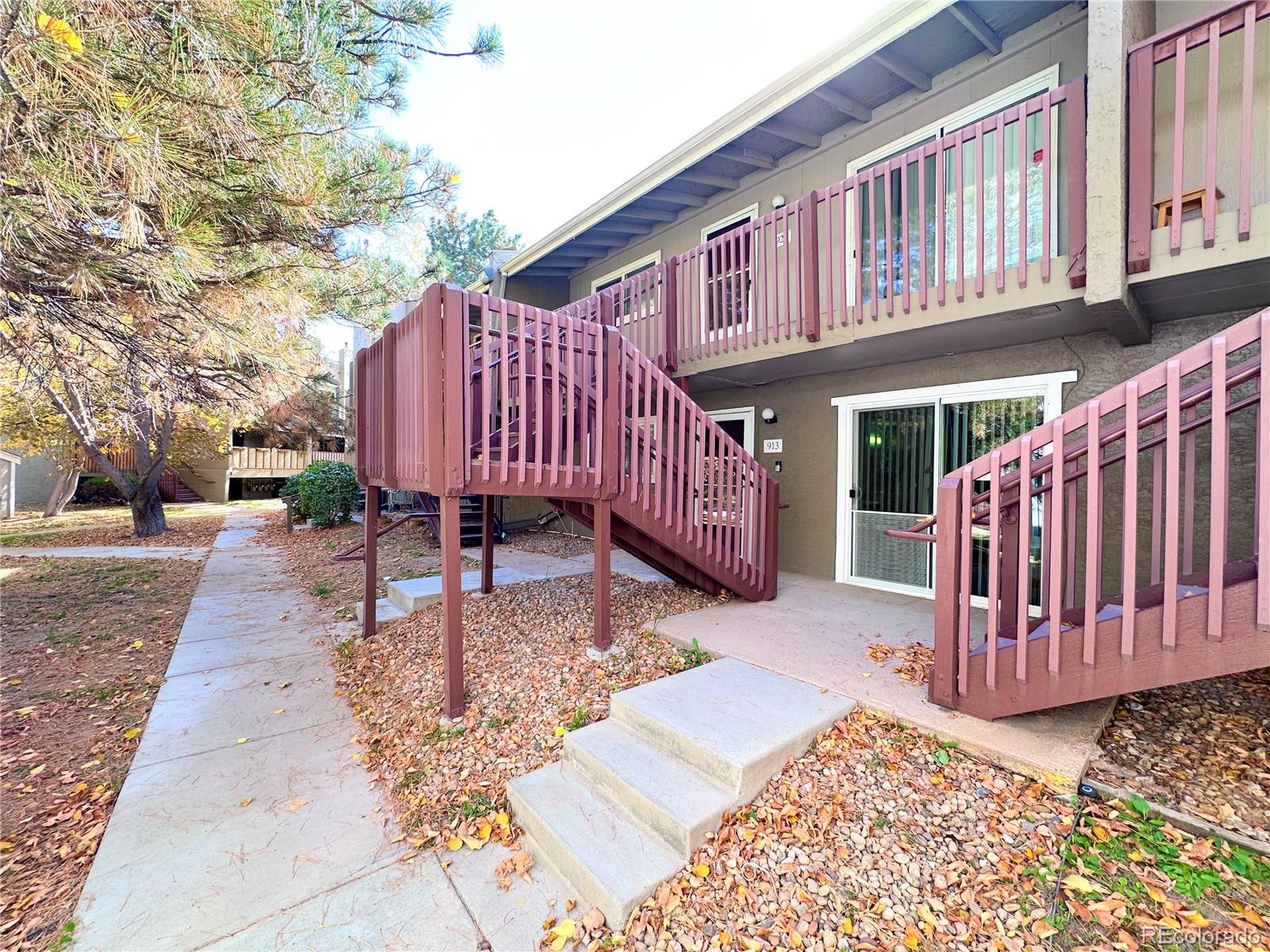 a view of a backyard with a deck