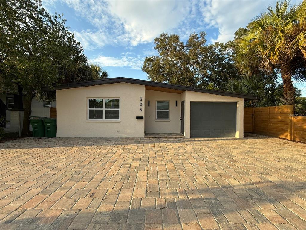 a house with trees in front of it