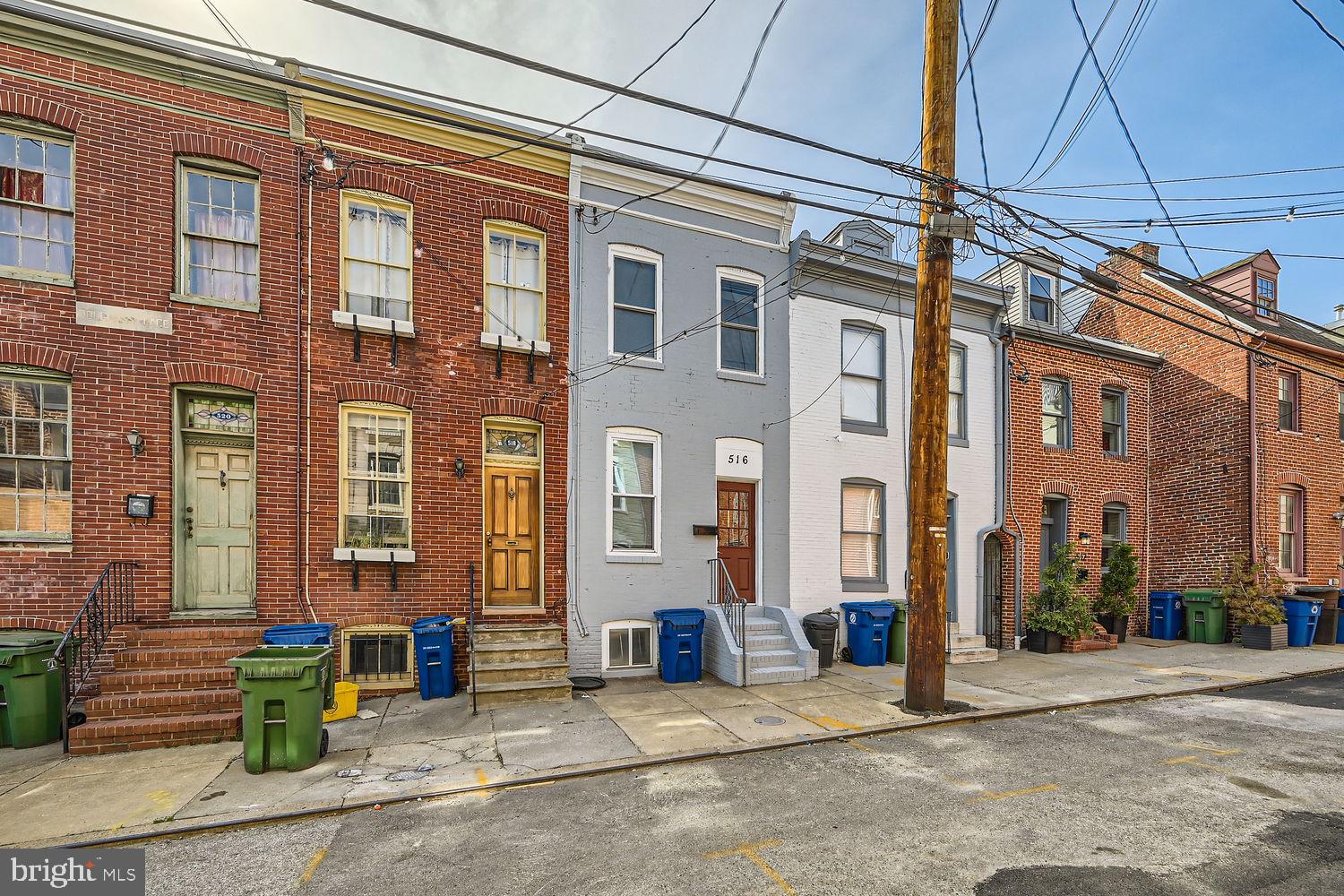 a view of a building with a street