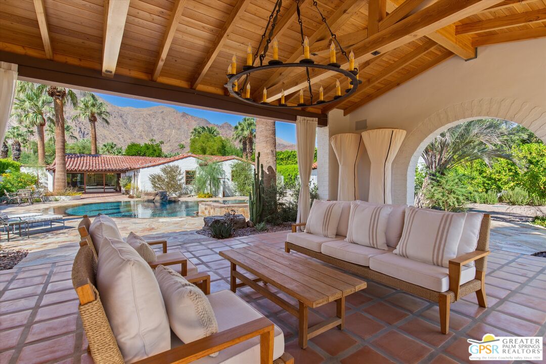 a outdoor living space with furniture and garden view