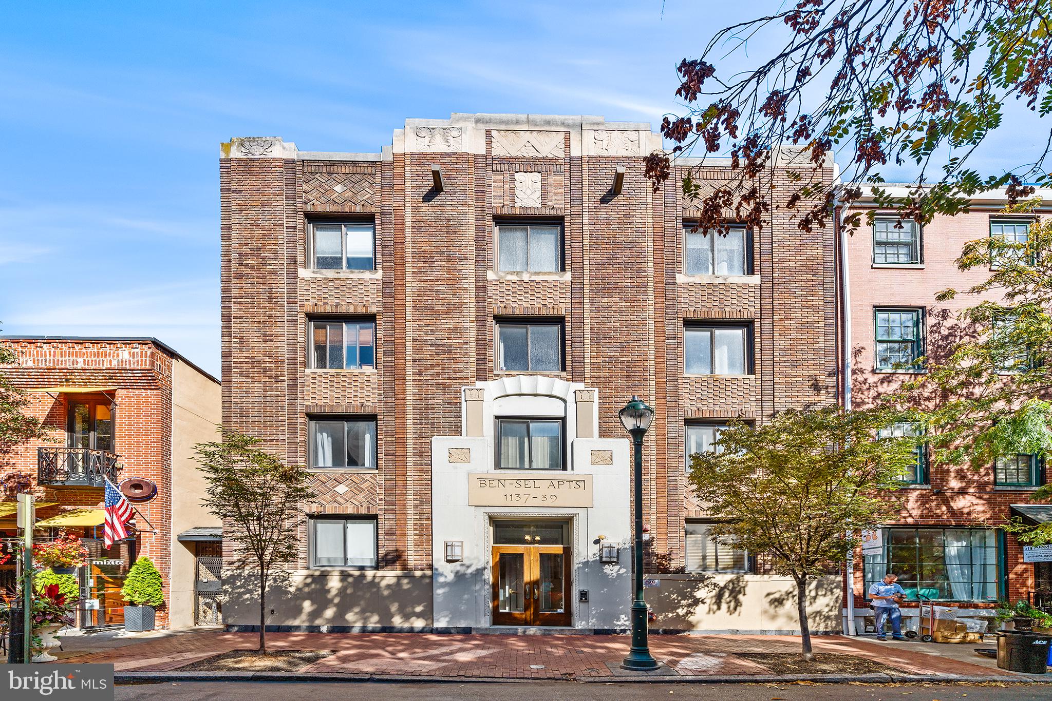 a front view of a building with street view