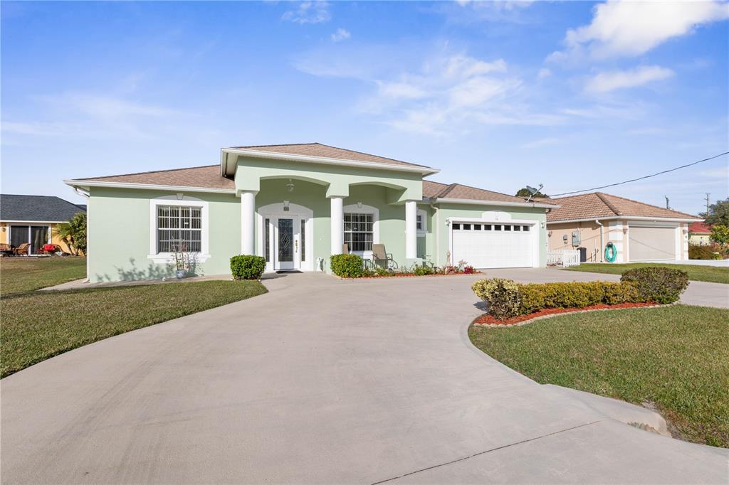 front view of a house with a yard