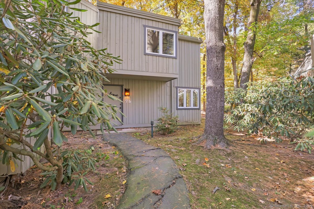 a view of a backyard of the house