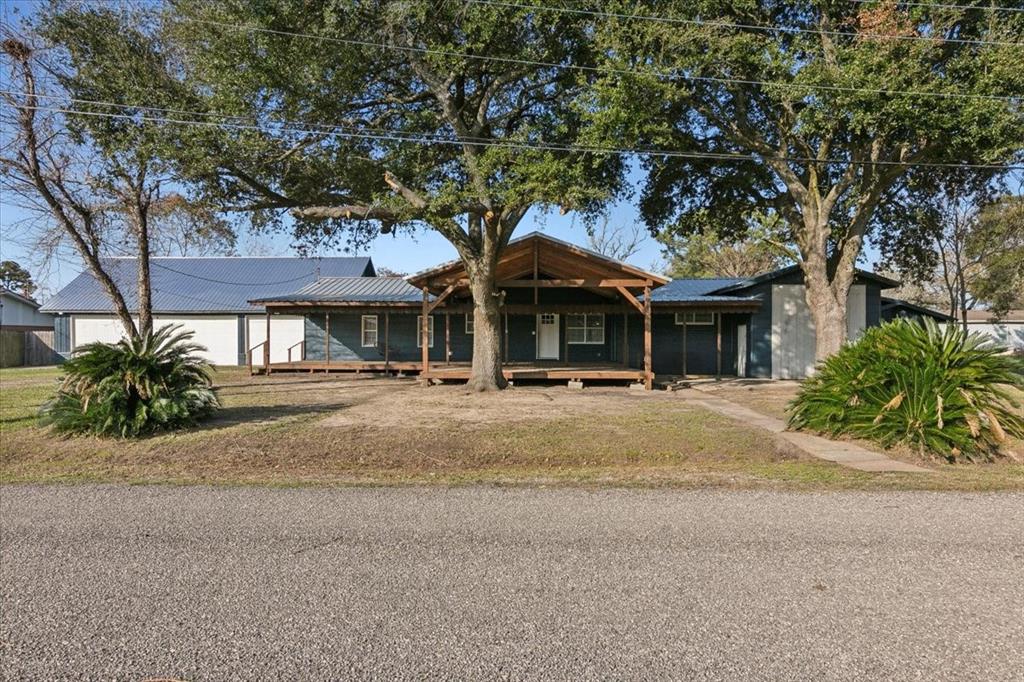 a front view of a house with yard