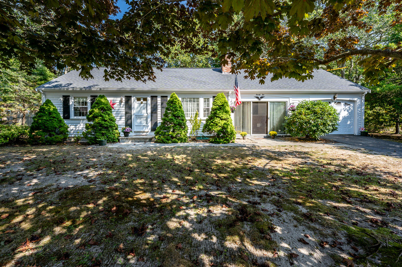 front view of a house with a yard