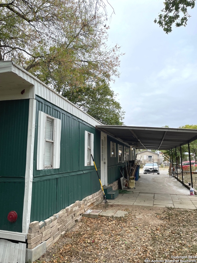 a view of a back yard of the house