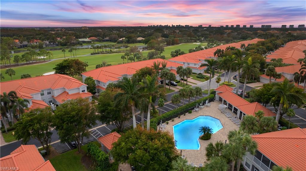 Aerial view at dusk with adjoining Pelican Marsh Golf Course