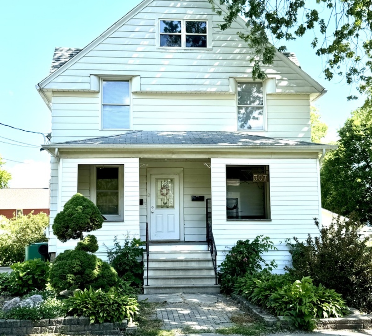 a view of a house with a small porch