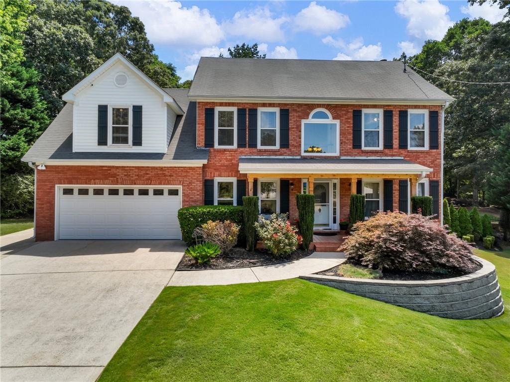 front view of house with a yard