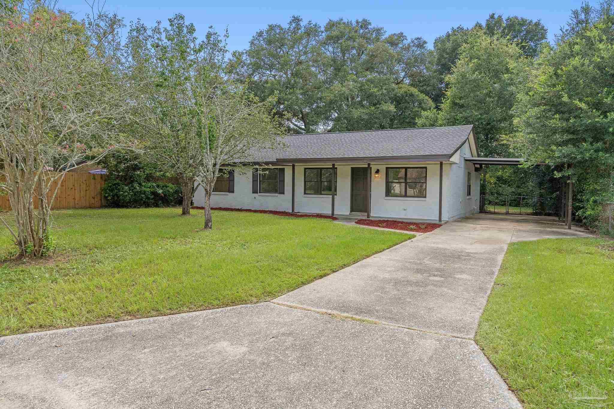 a view of outdoor space yard and front view of a house