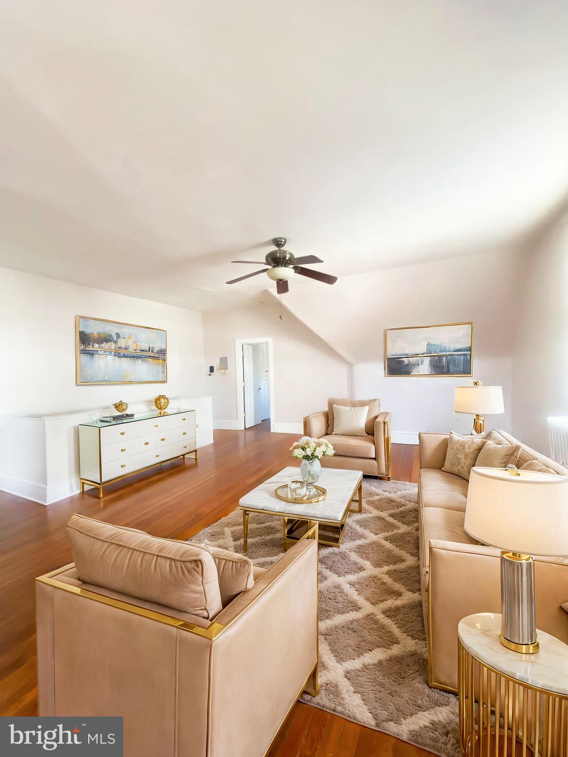 a living room with furniture and a table