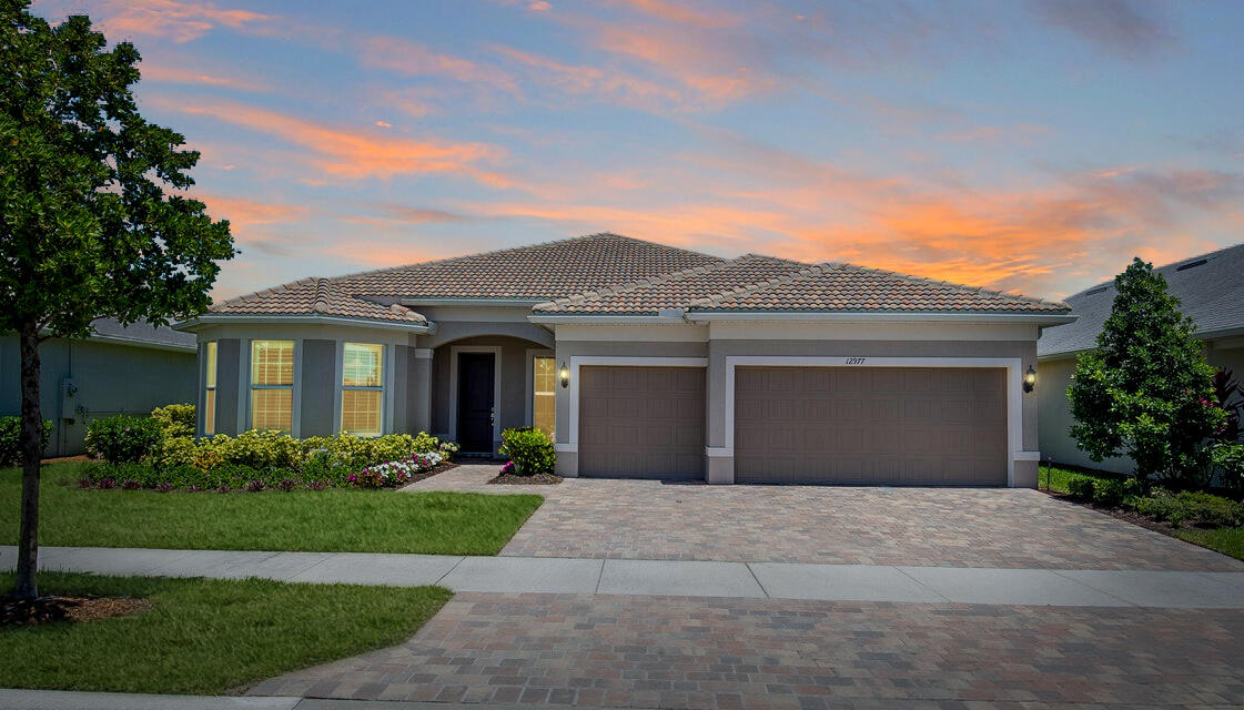 front view of a house with a yard