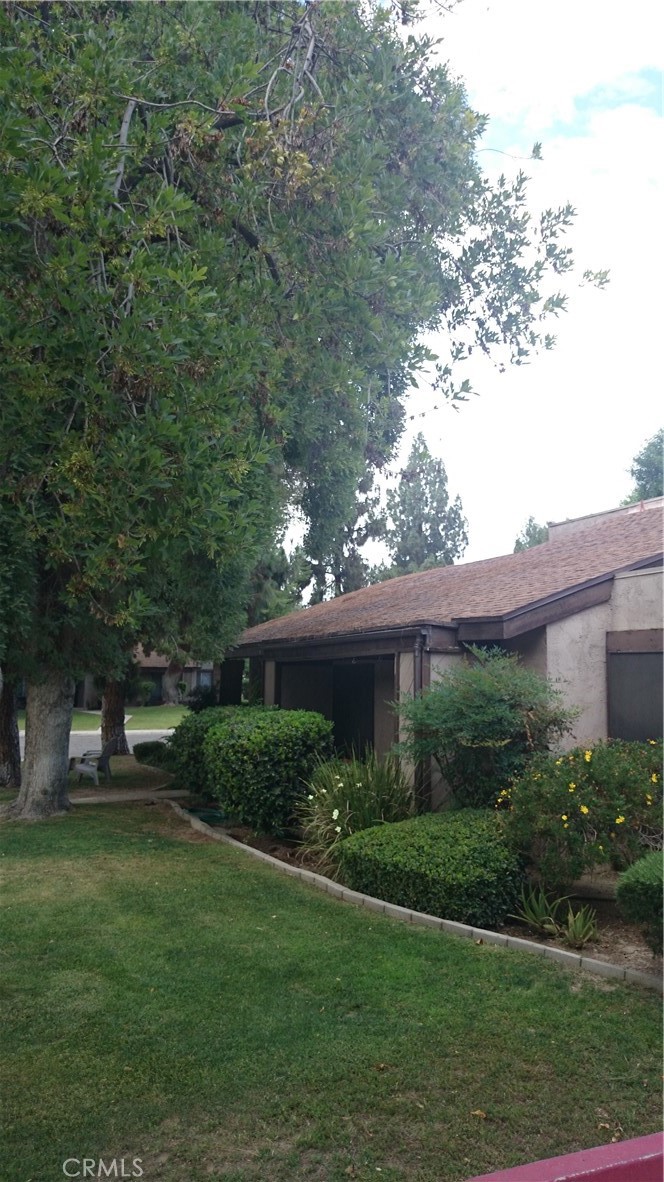 a view of backyard with green space