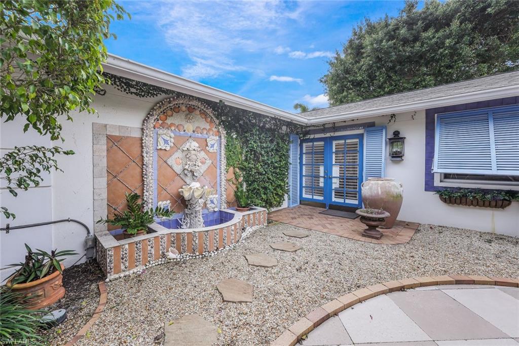 a front view of a house with patio