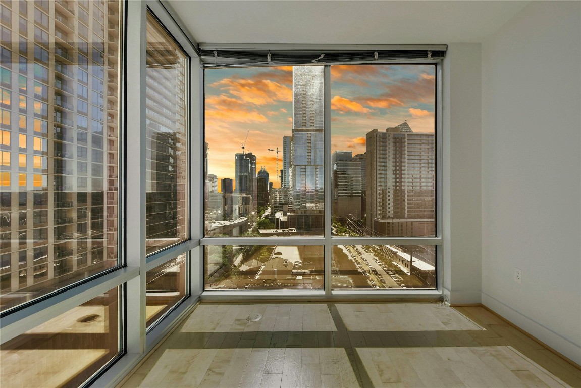 a view of a living room and a large window