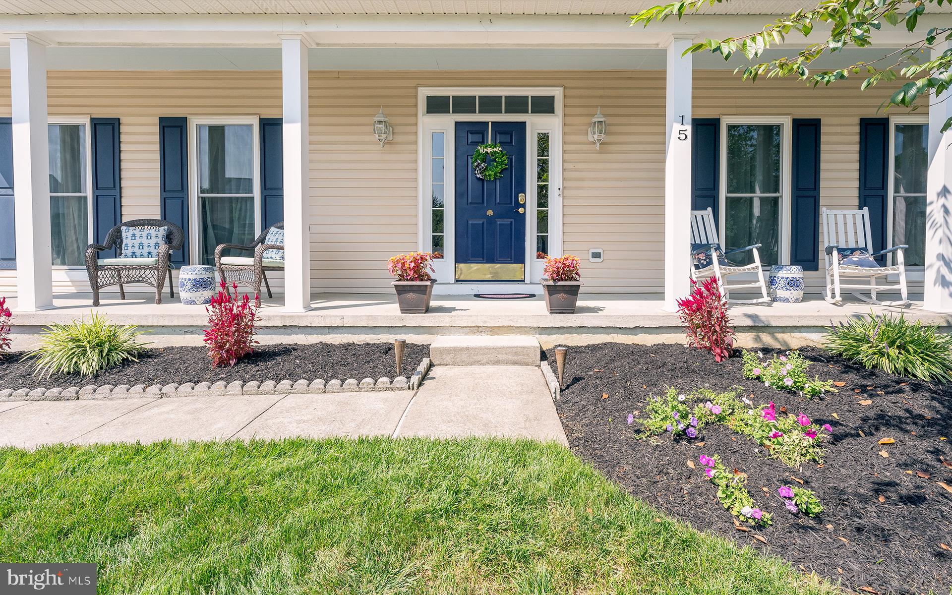 a front view of a house with outdoor space