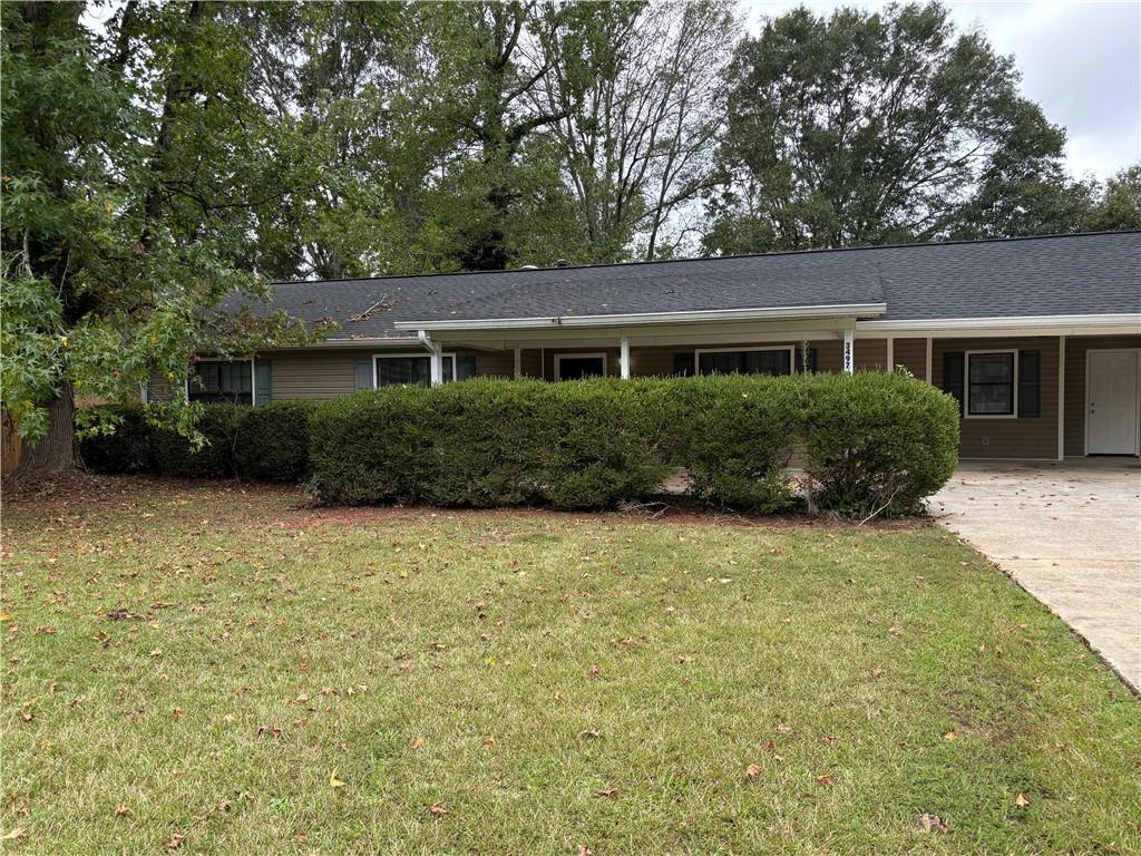 front view of a house with a yard