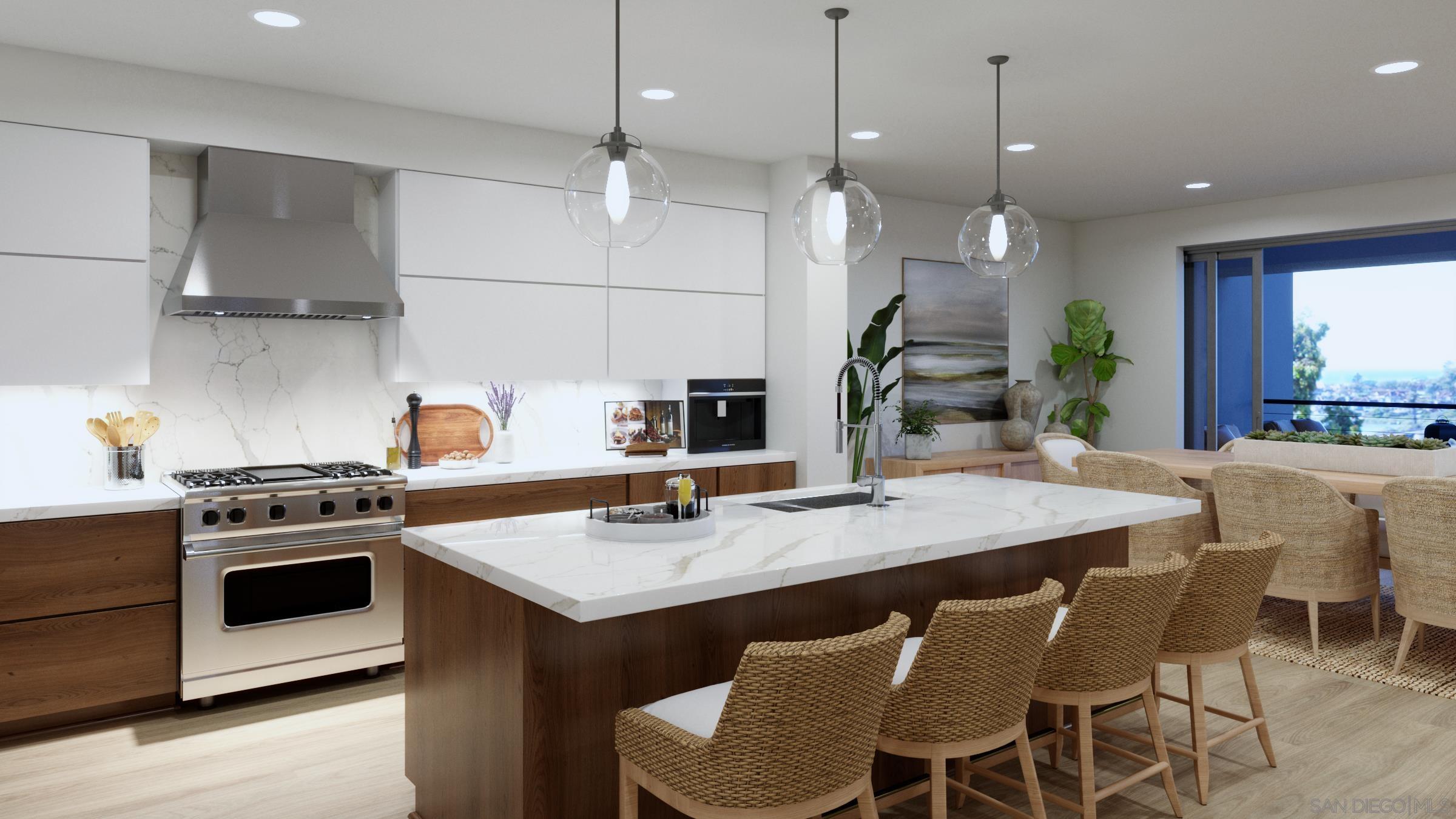 a kitchen with a stove a table and chairs in it