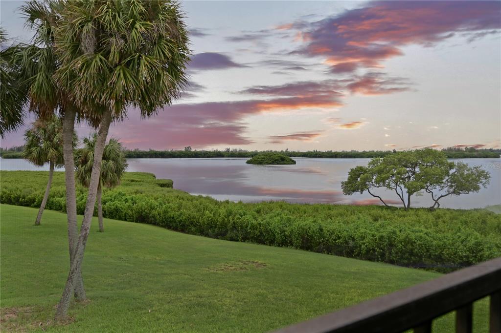 a view of a lake with a big yard