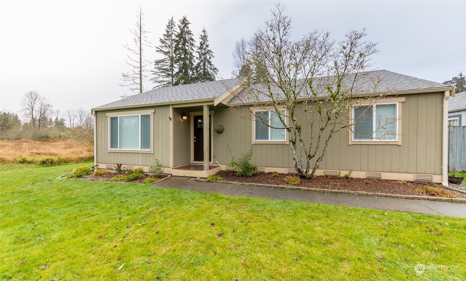 front view of a house with a yard