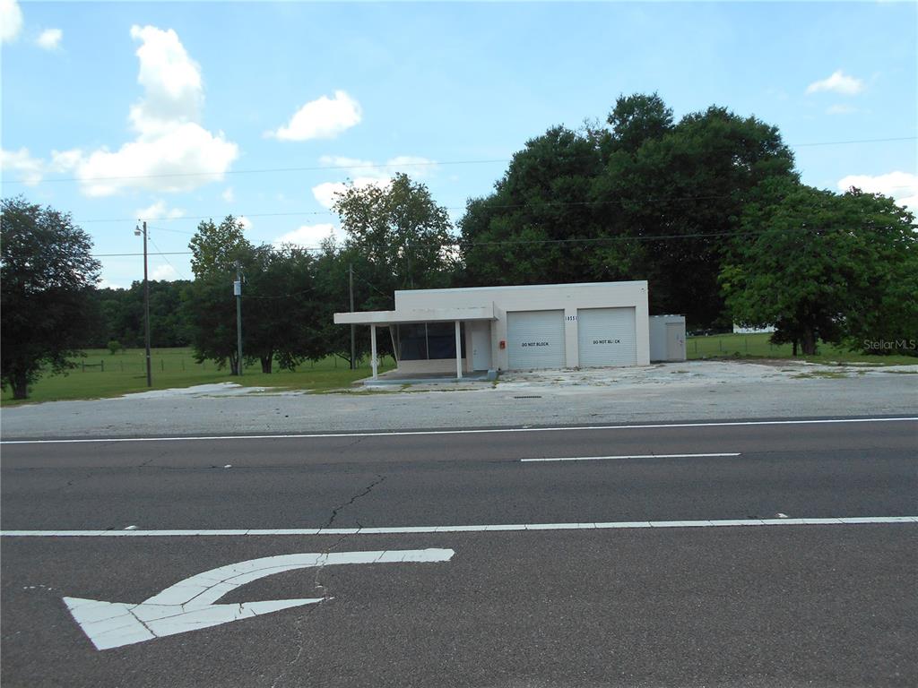 a view of a house with a large space