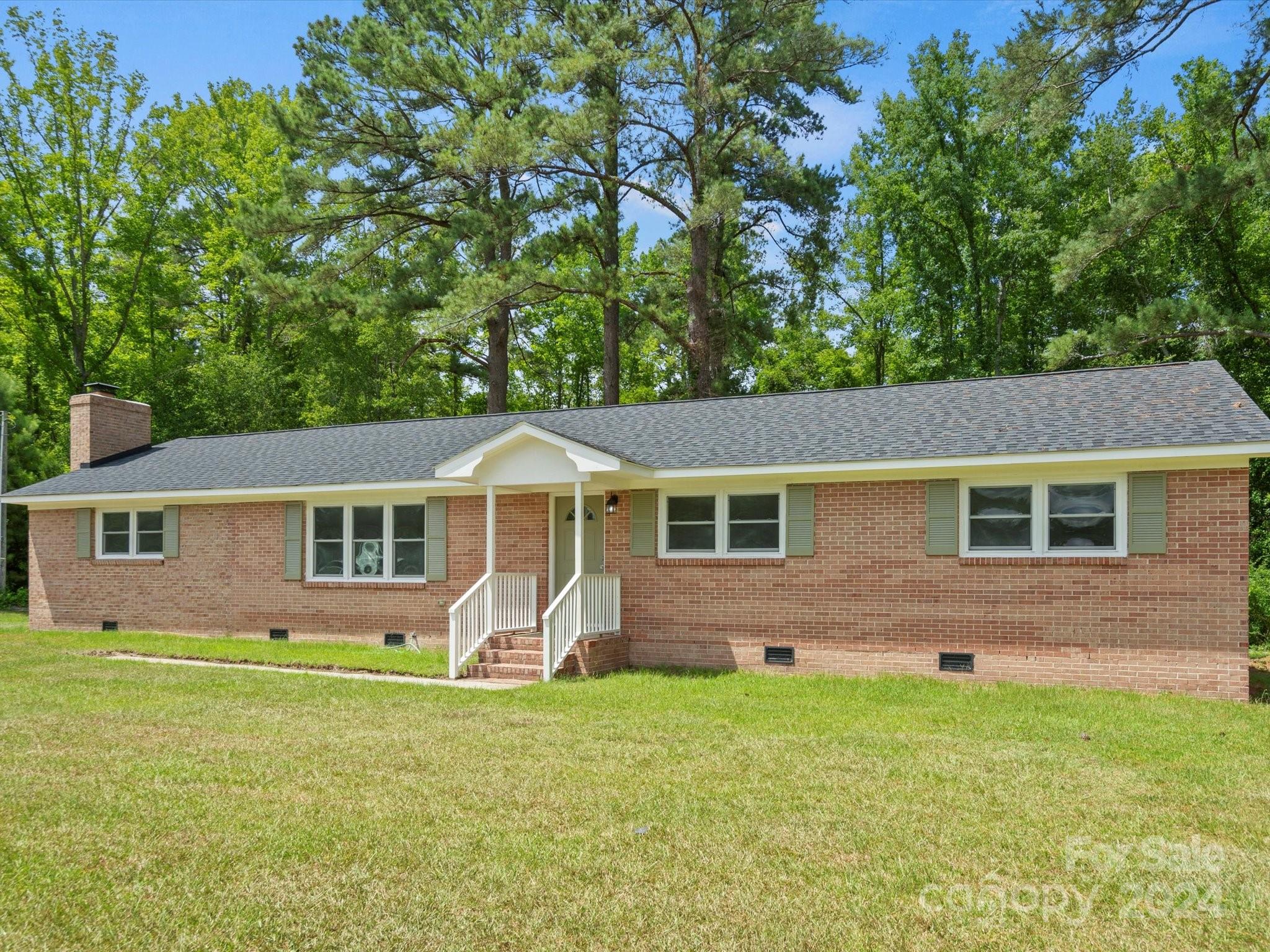 front view of house with a yard