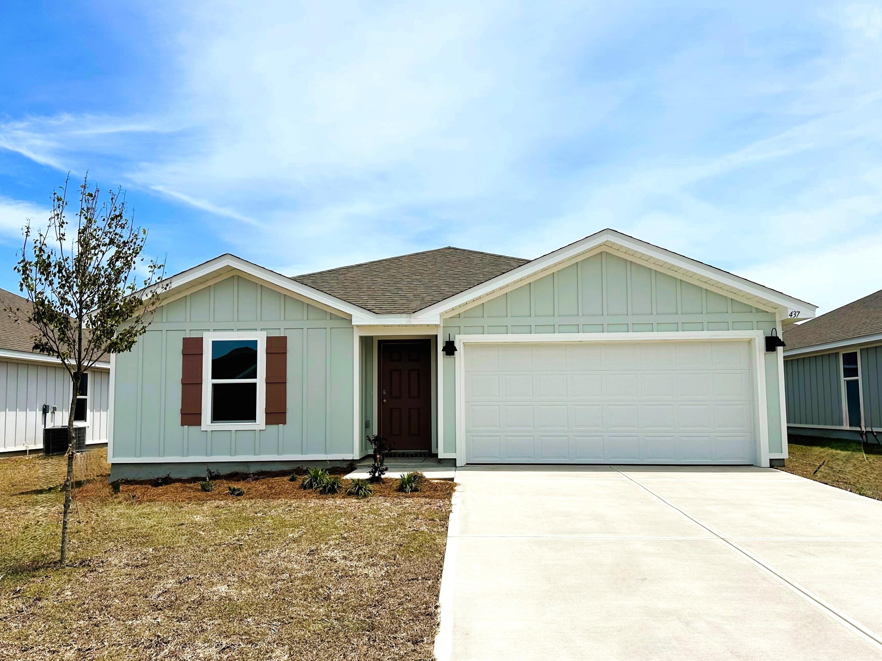 a front view of house with yard