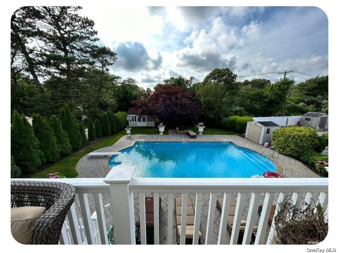 a view of a yard and outdoor seating