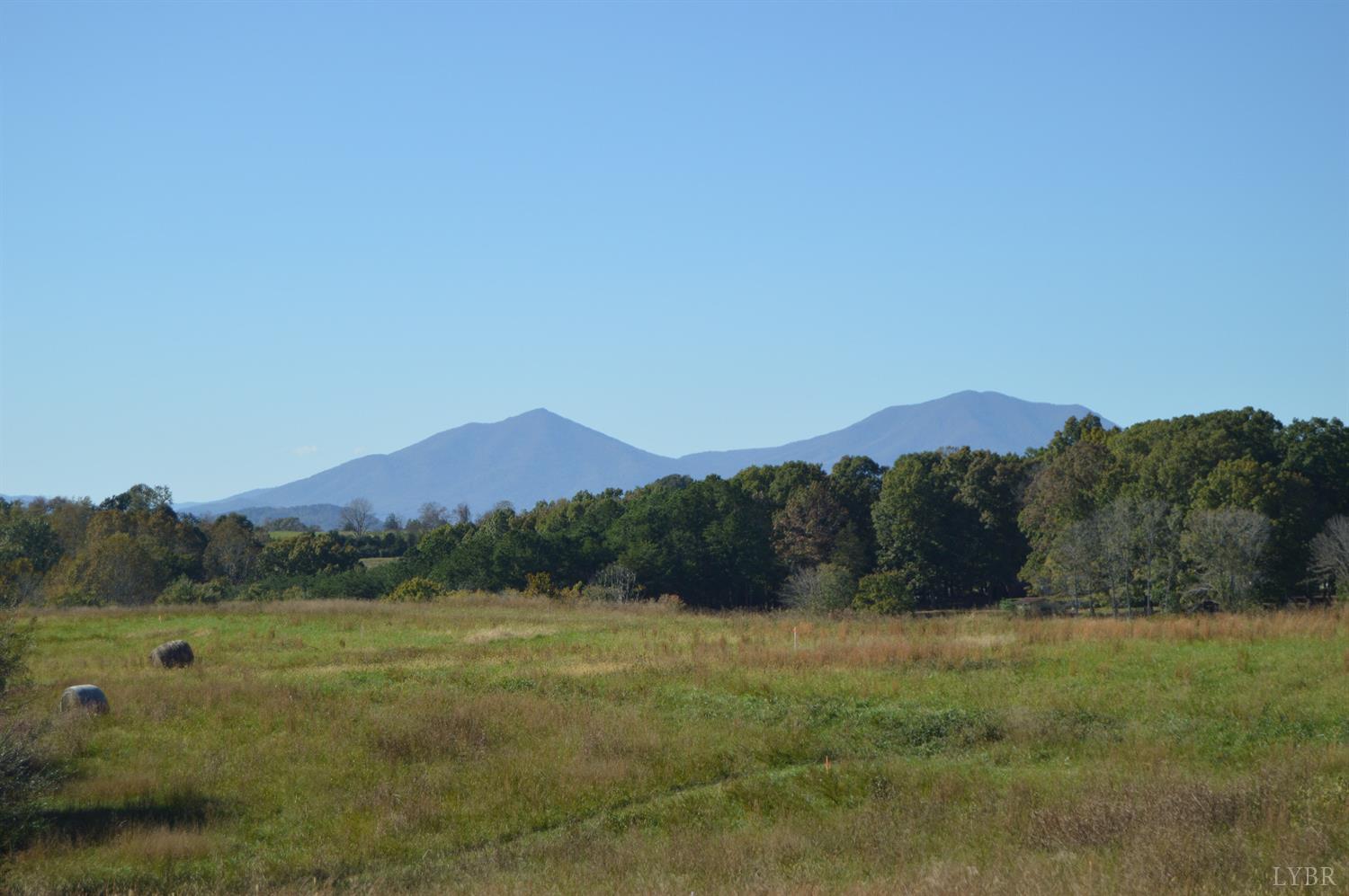 a view of mountain with outdoor space