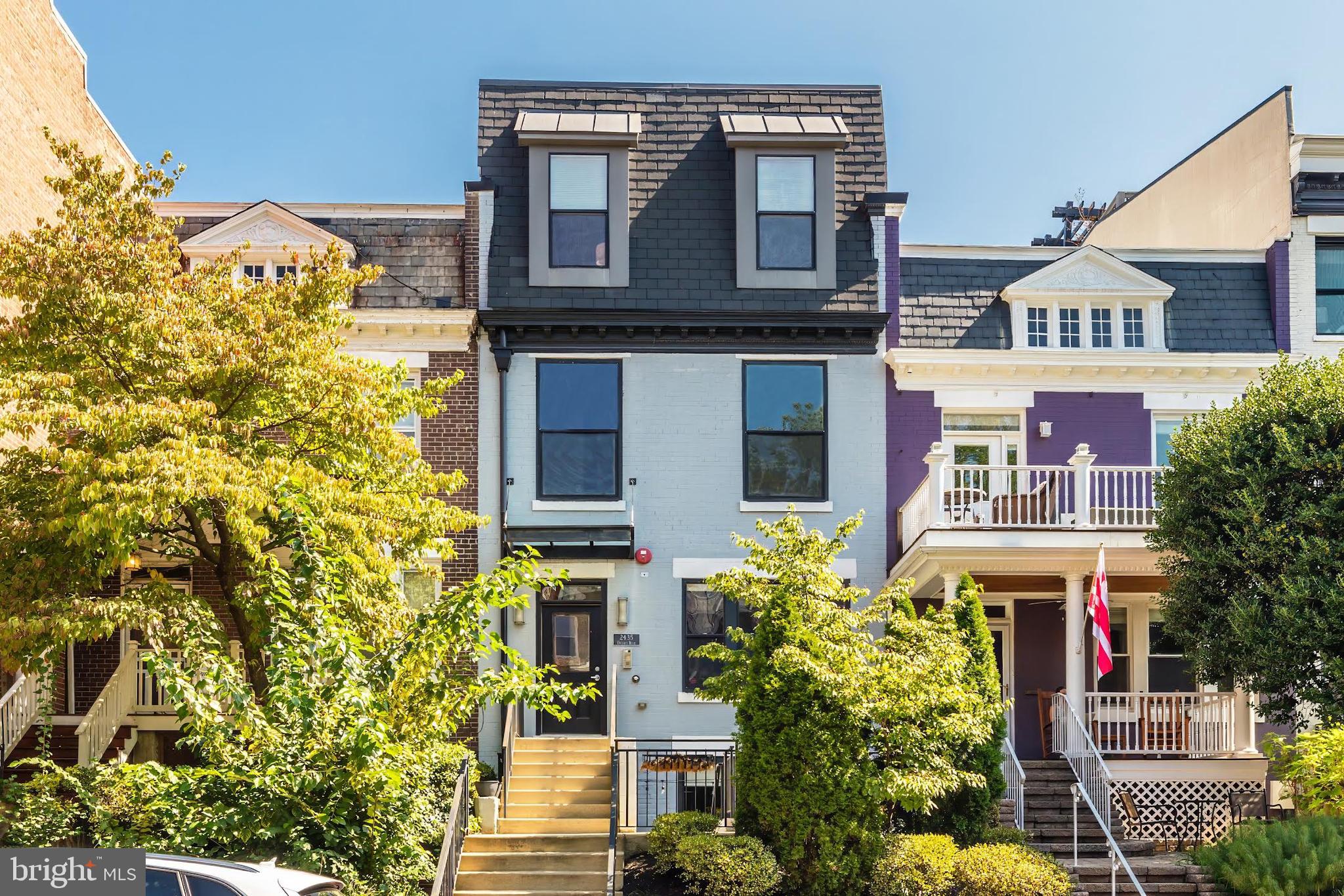 a front view of a multi story residential apartment building