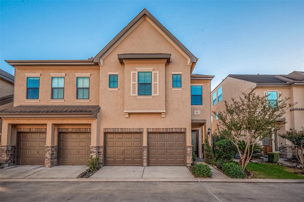 FRONT VIEW OF THE FRONT OF THIS LOVELY TOWNHOME