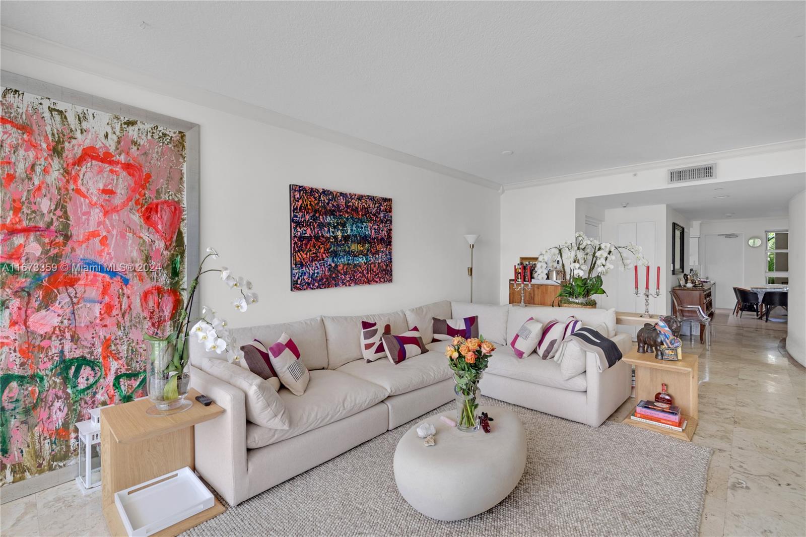 a living room with furniture and a couch