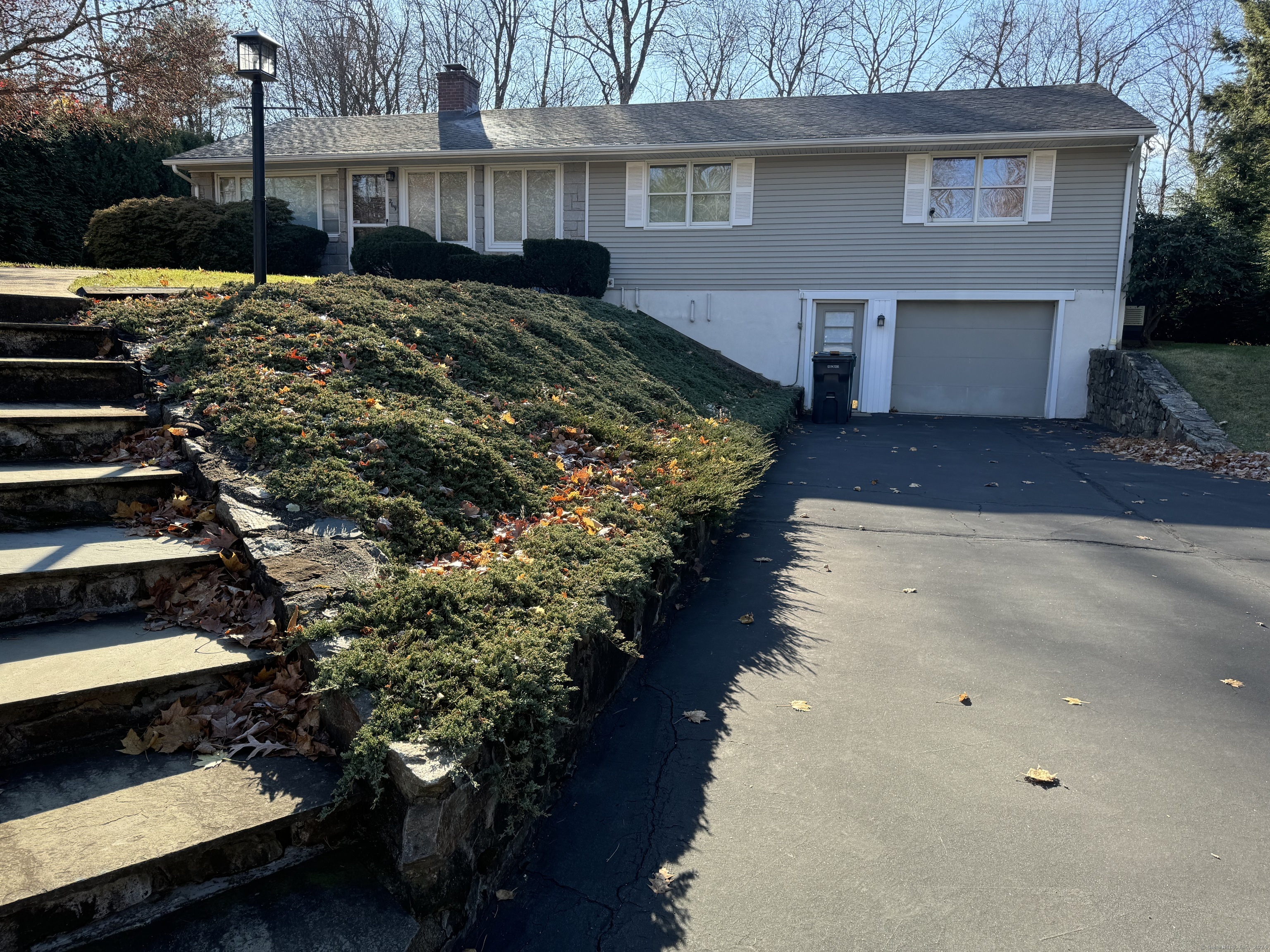 a back view of a house with a yard