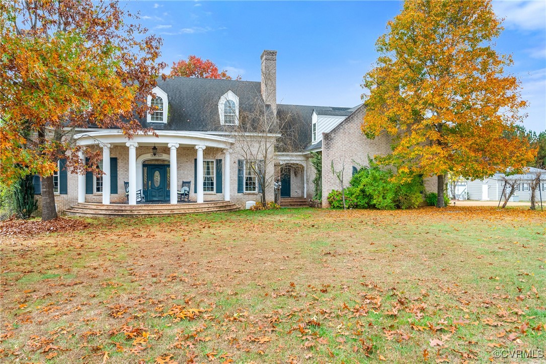 a front view of house with yard