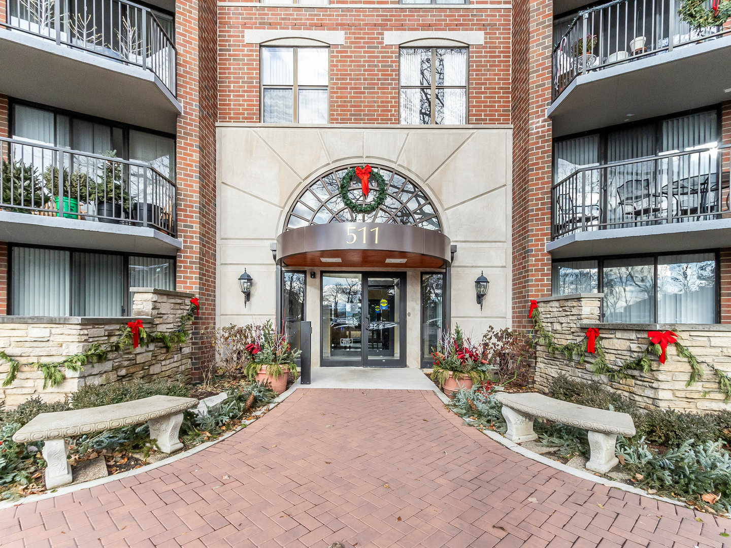 a front view of a building with an outdoor space