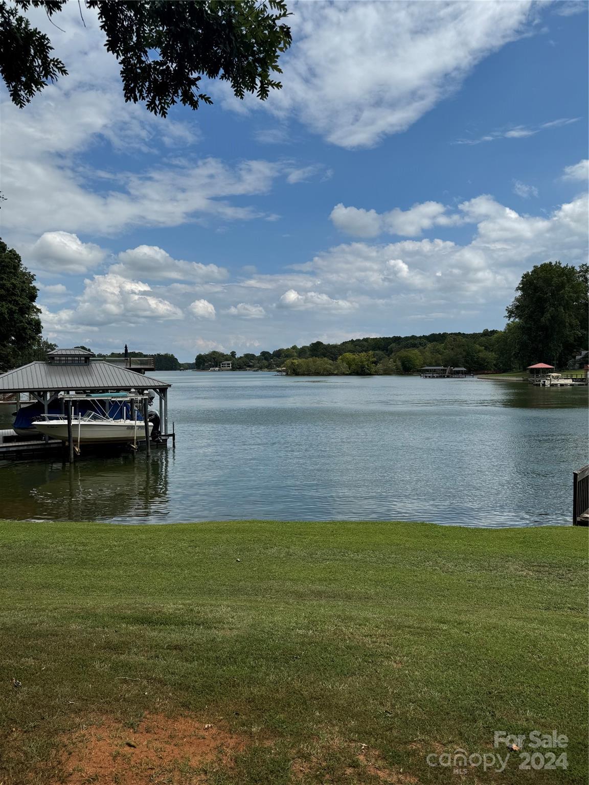 a view of a lake from a yard