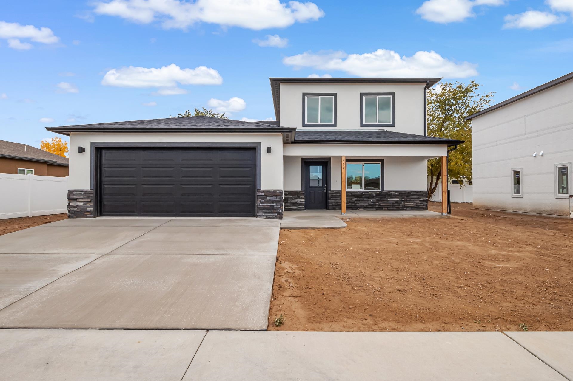 a front view of a house with a patio