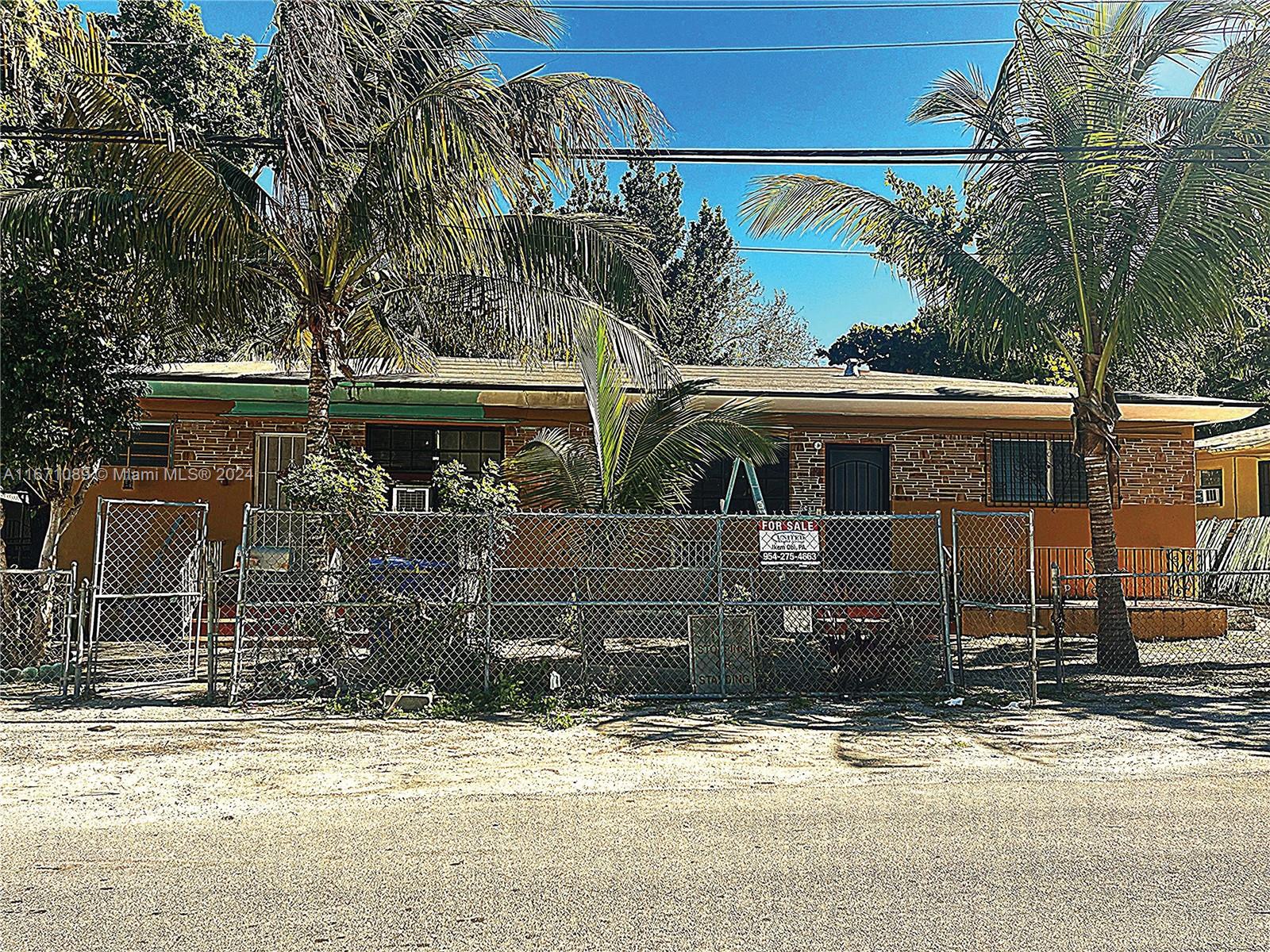 front view of a house with a street