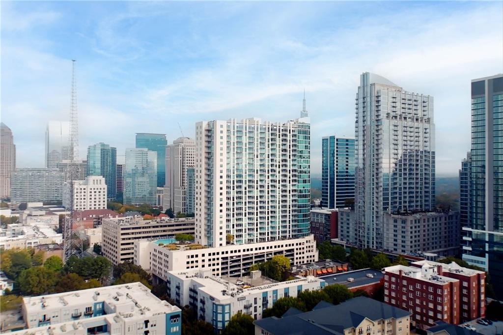 a view of city with tall buildings